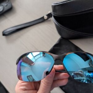 Stylish Oakley Black Sunglasses with Blue Lenses